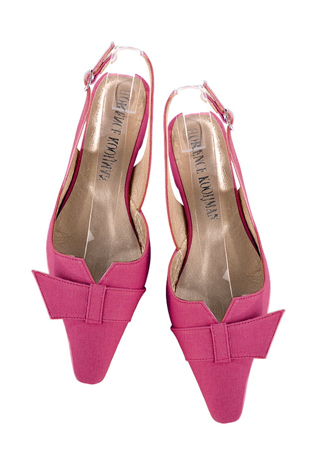 Women's hot pink slingback dress shoes, with a knot on the front. Tapered toe. Low block heels - Top view